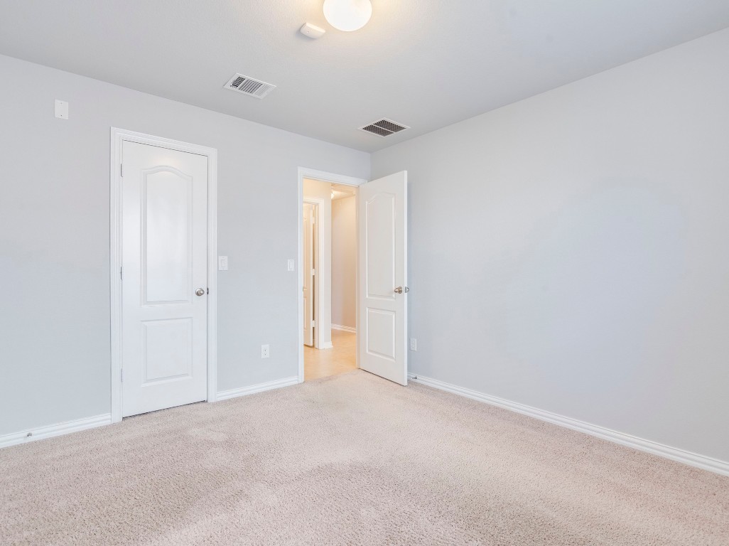 225 Razzmatazz Trail Buda, TX 78610 - Photo 21 of 28 a view of an empty room
