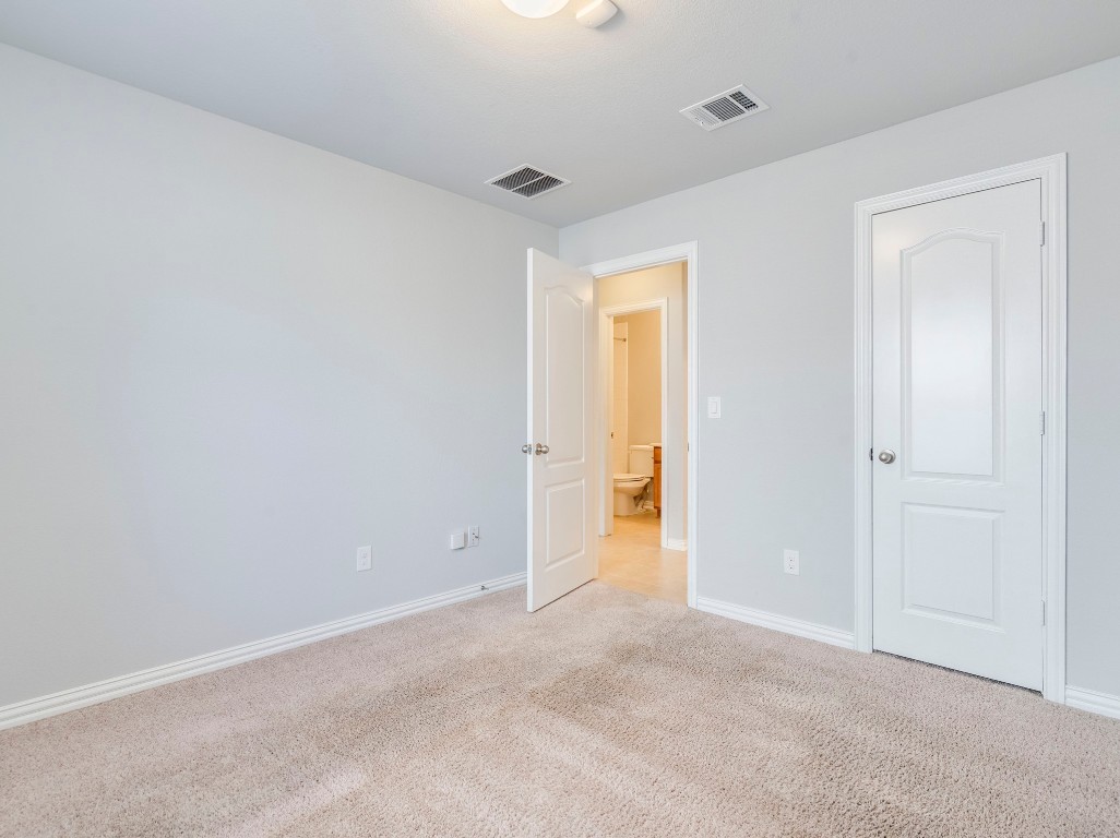 225 Razzmatazz Trail Buda, TX 78610 - Photo 23 of 28 a view of an empty room