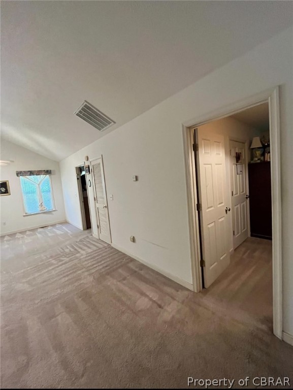 2625 Hickory Fork Road Gloucester, VA 23061 - Photo 3 of 7 Empty room with lofted ceiling and carpet floors
