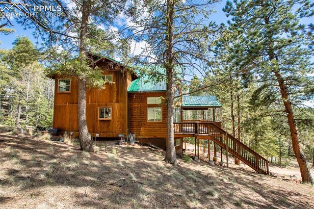 398 Pinewood Road Florissant, CO 80816 - Photo 6 of 43 side view of house