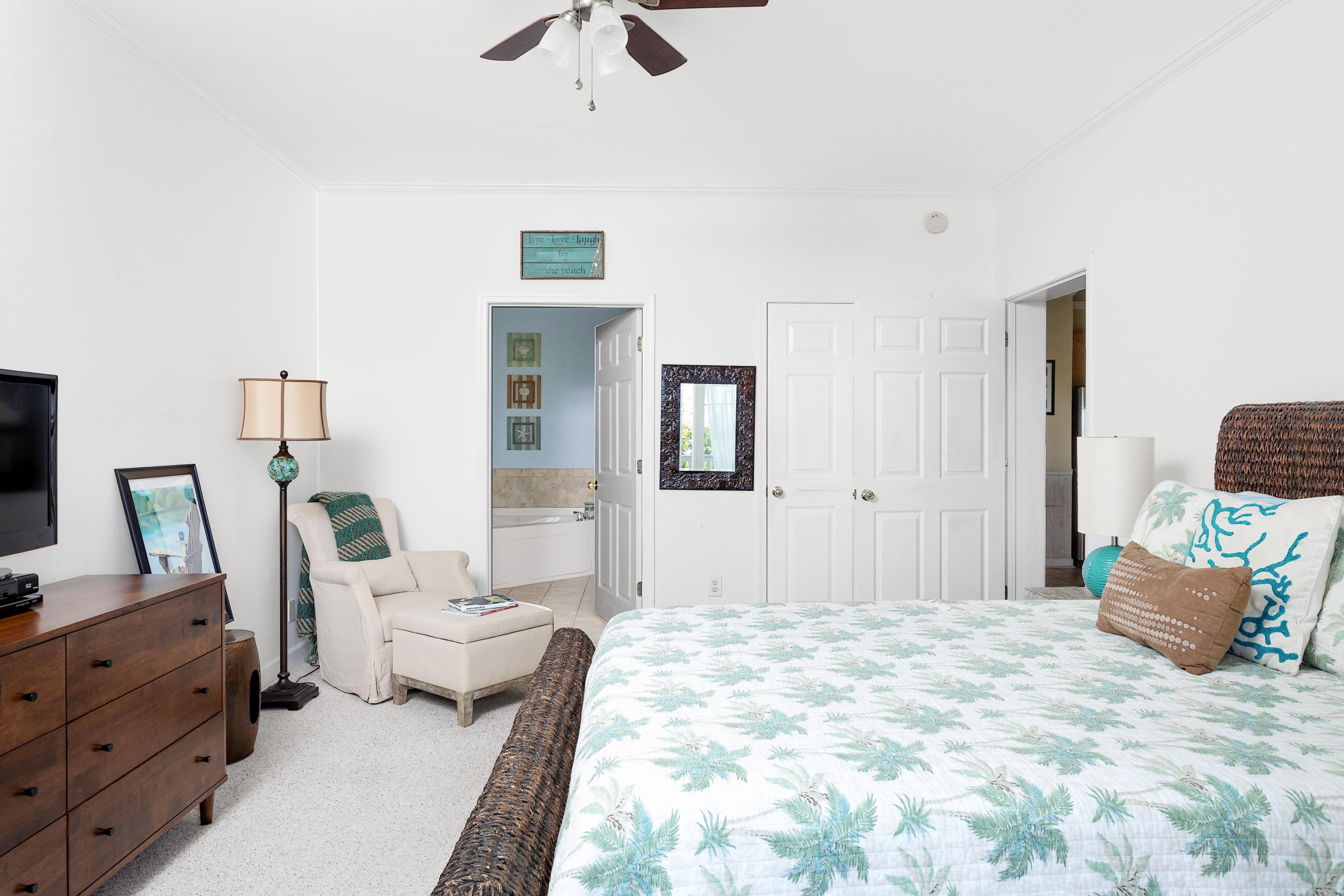 2393 Folly Road, Unit 1B Folly Beach, SC 29439 - Photo 8 of 21 master bedroom with ensuite bath