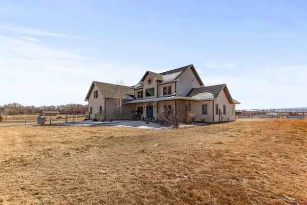 a view of a house with a flat screen tv