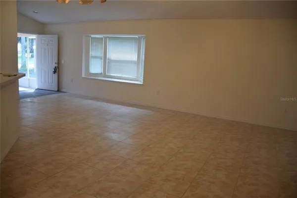 a view of a storage & utility room with a sink