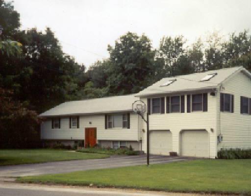 7 Round Table Road New Milford, CT 06776 - Photo 1 of 1 a front view of a house with a yard