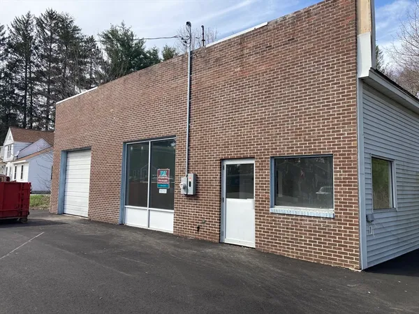 a front view of a house with a garage
