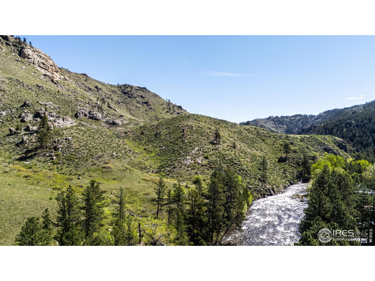 0 Wild River Road Bellvue, CO 80512 - Photo 5 of 14 a black and white photo of a mountain