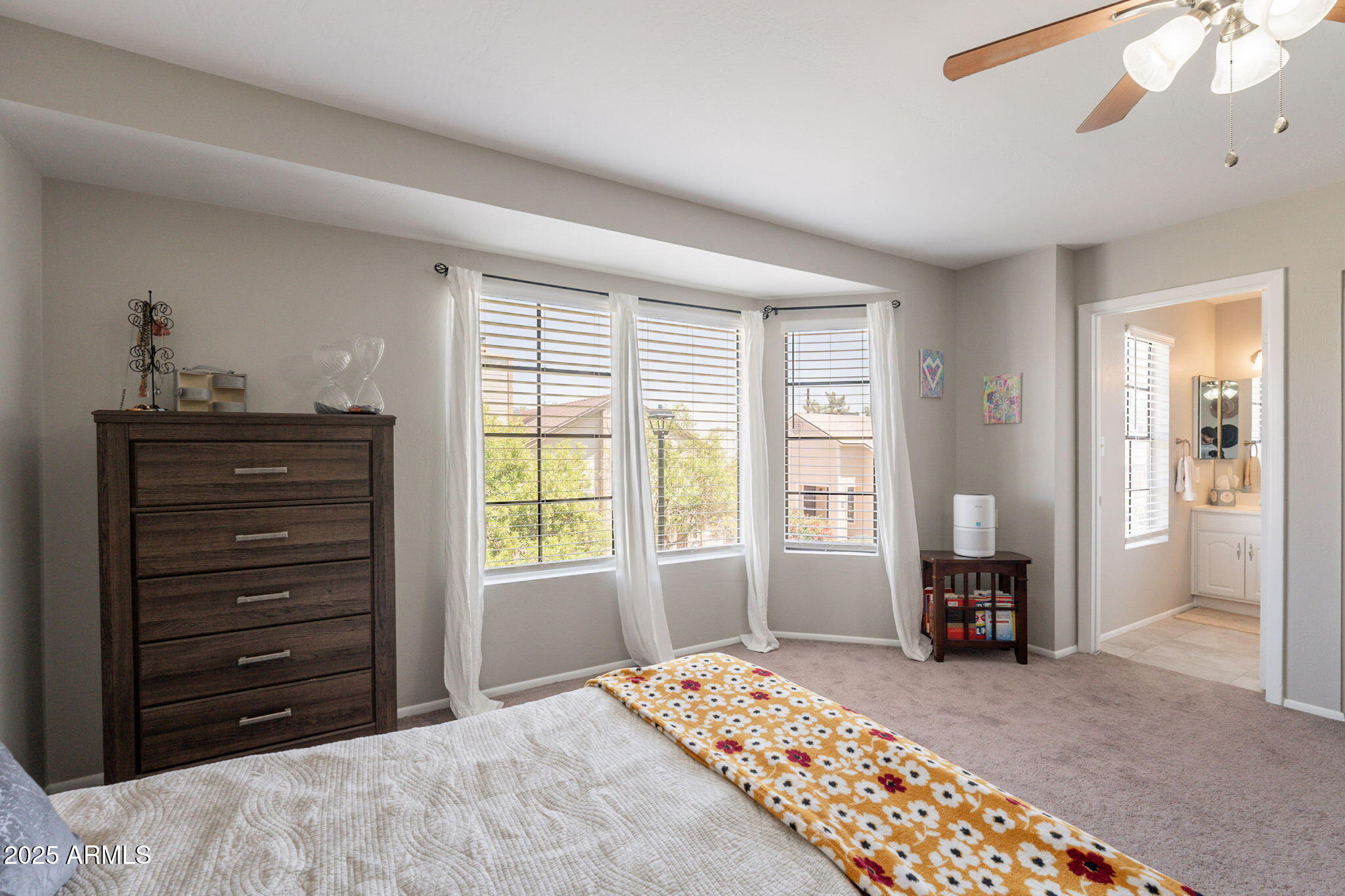 2455 East Broadway Road, Unit 115 Mesa, AZ 85204 - Photo 12 of 17 a bedroom with a bed and a window