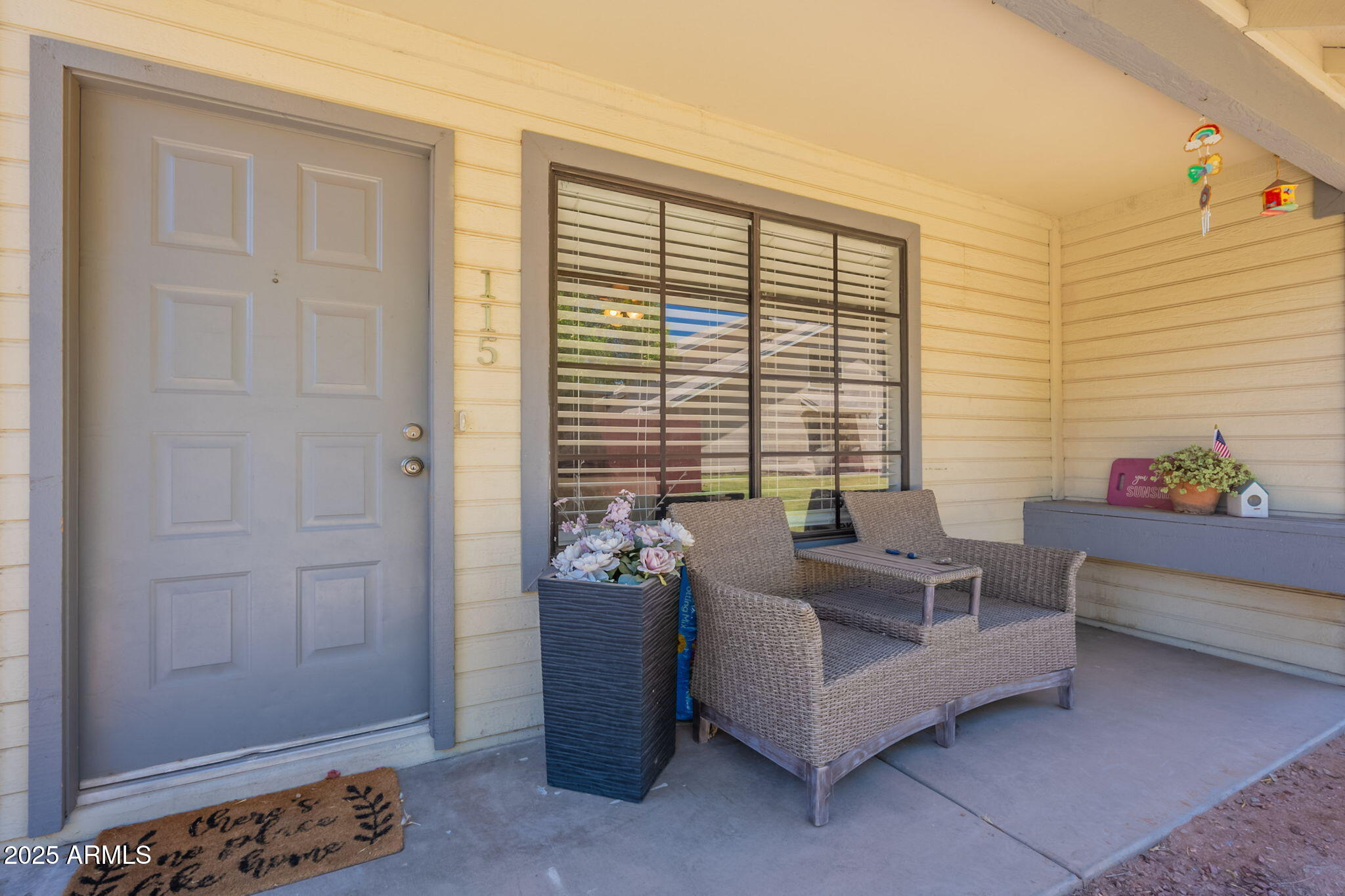 2455 East Broadway Road, Unit 115 Mesa, AZ 85204 - Photo 6 of 17 a living room with furniture and a window