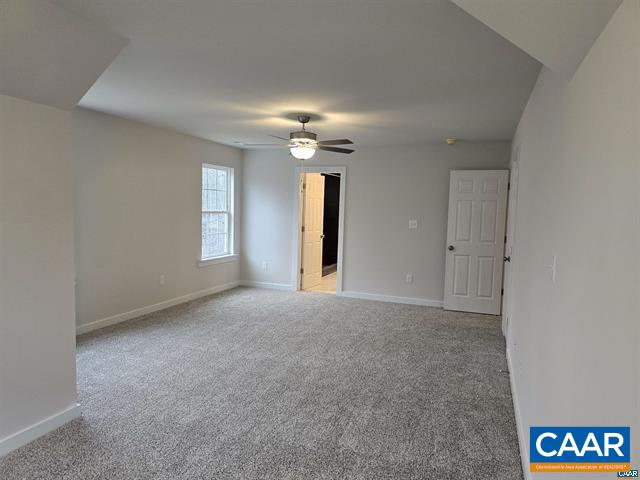 115 Bacon Bit Lane Louisa, VA 23093 - Photo 18 of 29 an empty room with windows and fan