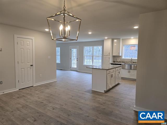 115 Bacon Bit Lane Louisa, VA 23093 - Photo 10 of 29 a kitchen with stainless steel appliances granite countertop a stove and a refrigerator