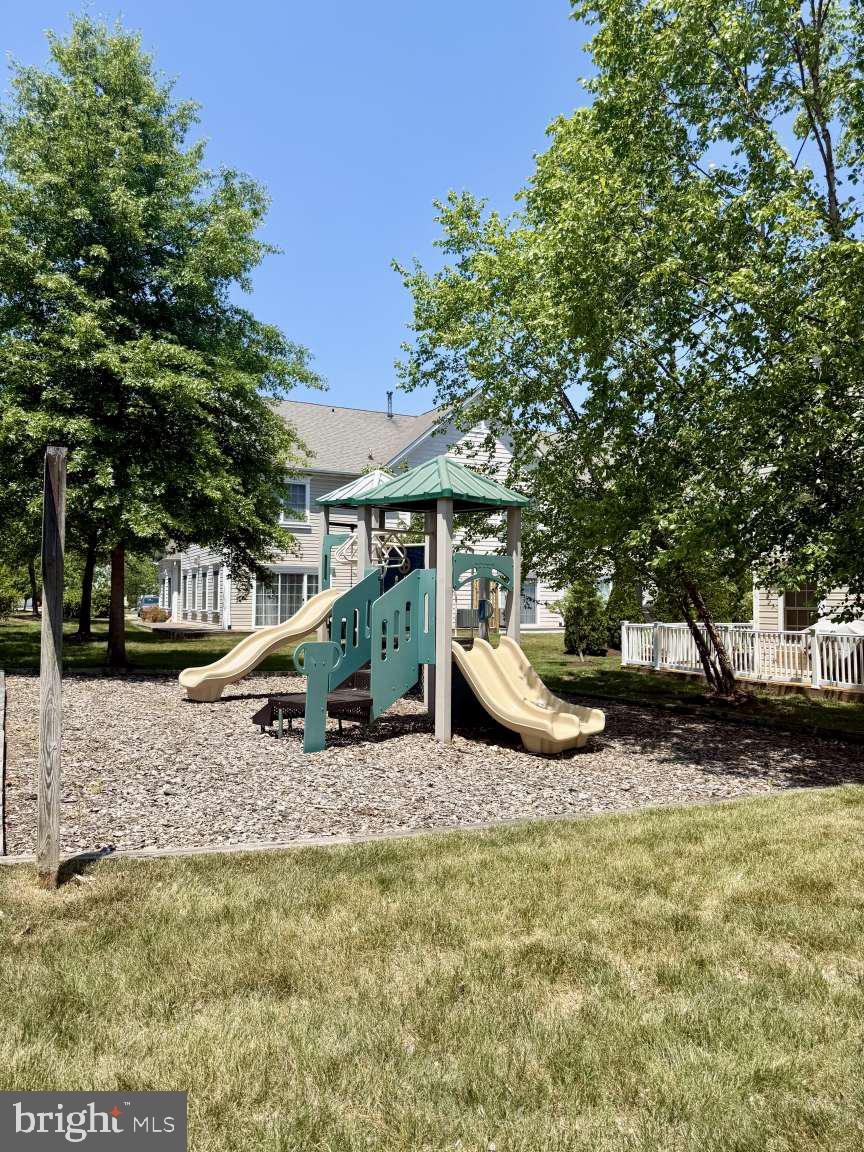 629 Ruxton Road, Unit 74 Solomons, MD 20629 - Photo 24 of 24 a view of a house with backyard and sitting area