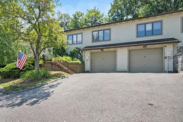 a front view of house with yard