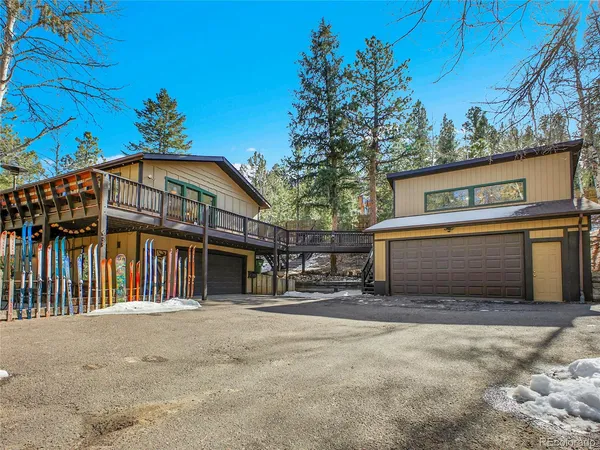 a view of a house with a garage