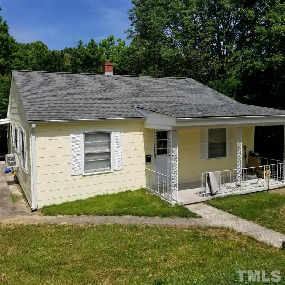 107 Allgood Street Roxboro, NC 27573 - Photo 12 of 12 a view of a house with backyard and garden