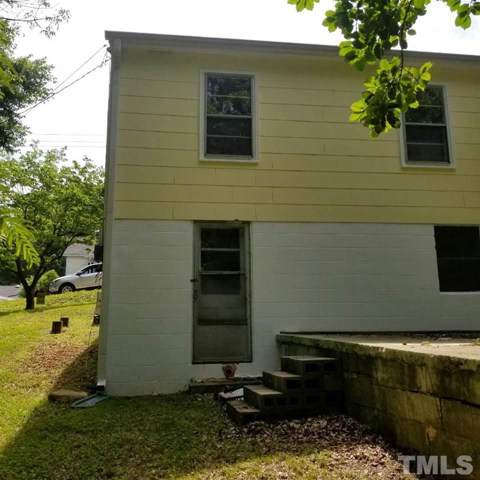 107 Allgood Street Roxboro, NC 27573 - Photo 6 of 12 a view of a backyard of the house