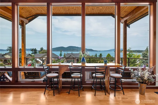 a view of a balcony with wooden floor