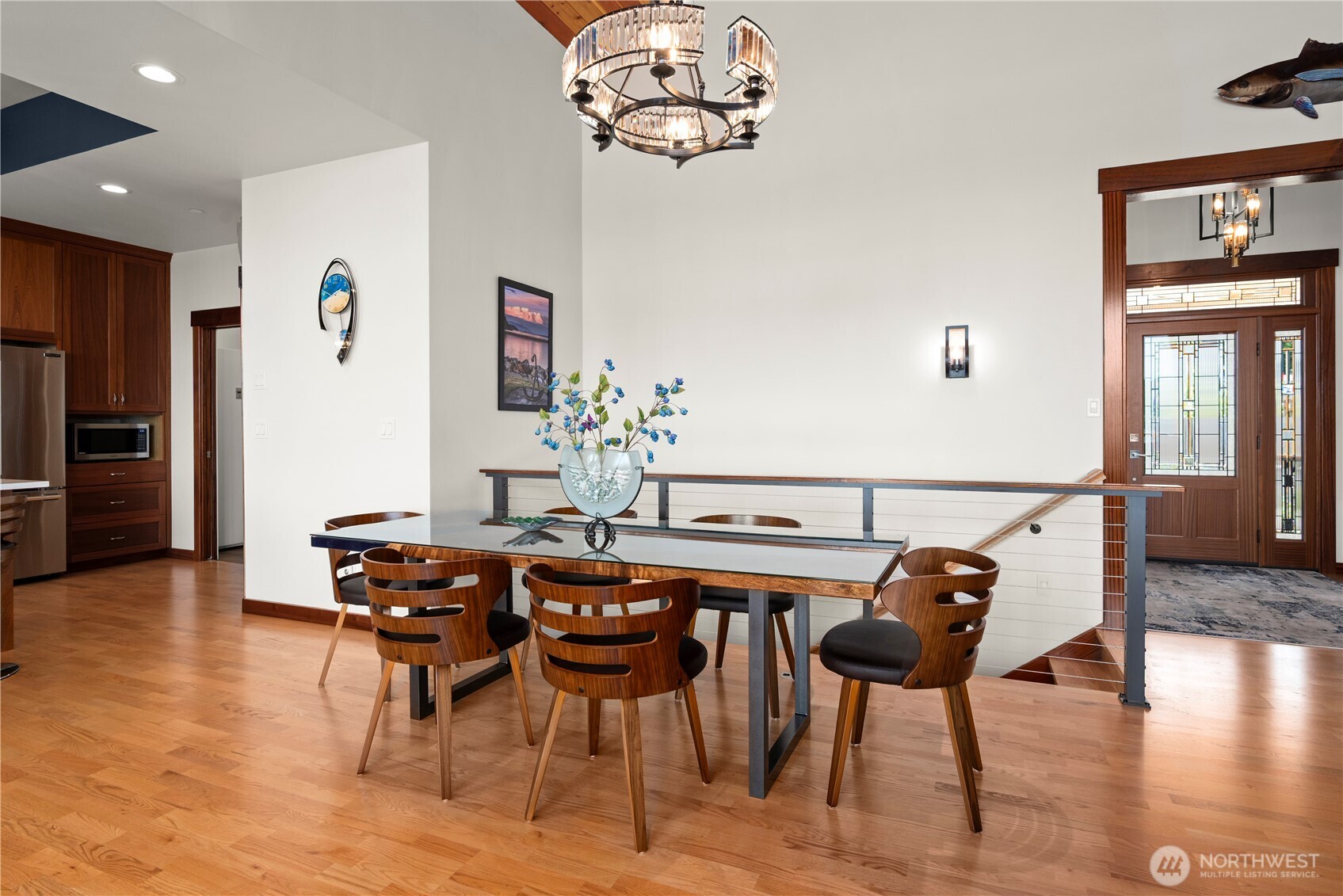 3803 West 2nd Street Anacortes, WA 98221 - Photo 13 of 40 a view of a dining room with furniture and wooden floor