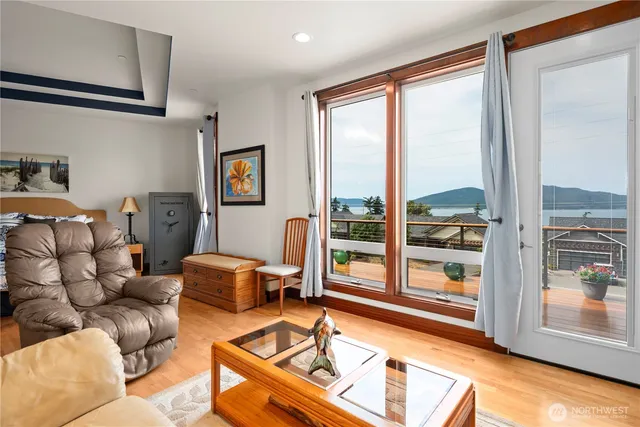 a kitchen with stainless steel appliances granite countertop a stove microwave refrigerator and sink