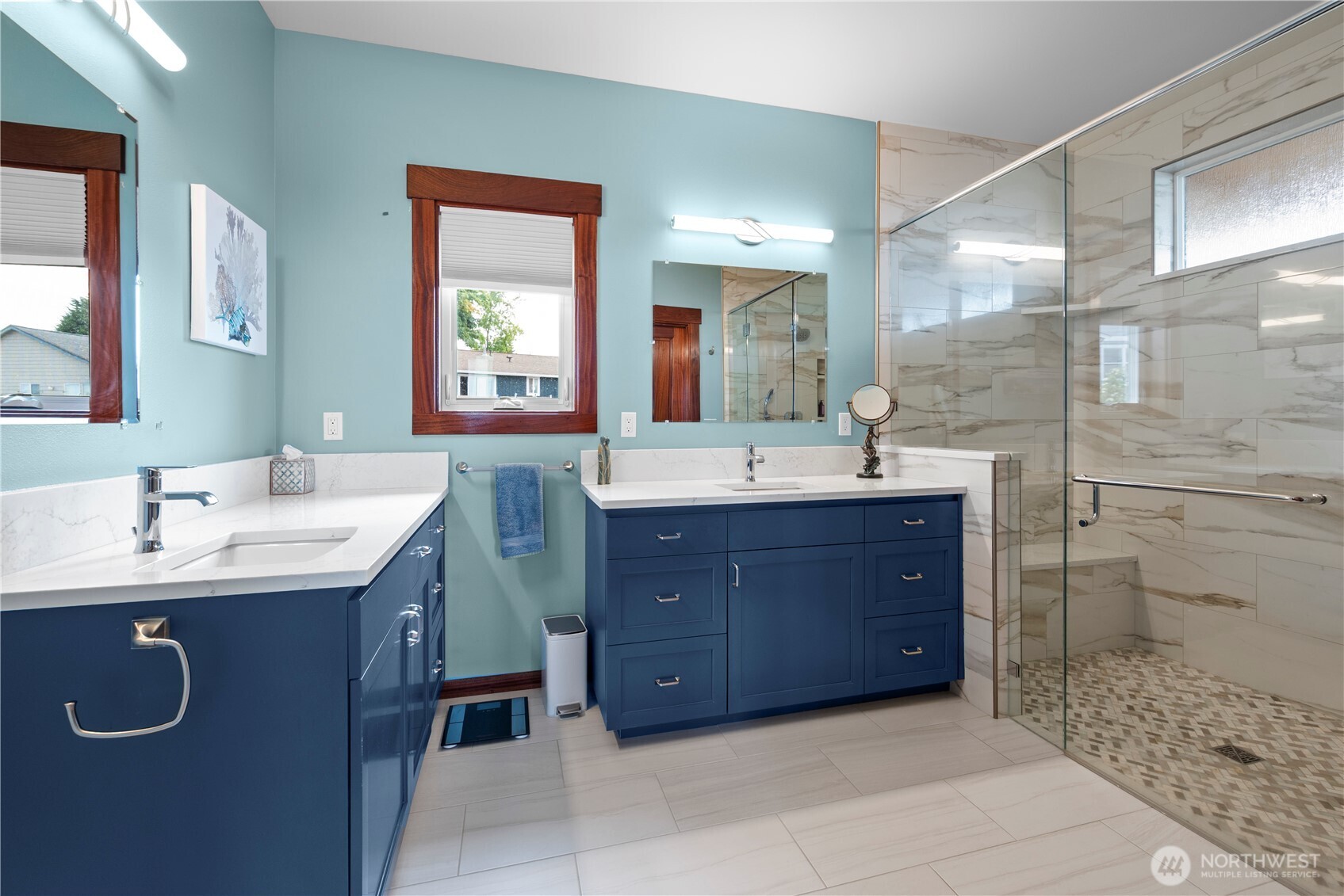 3803 West 2nd Street Anacortes, WA 98221 - Photo 25 of 40 a bathroom with a sink double vanity and a mirror
