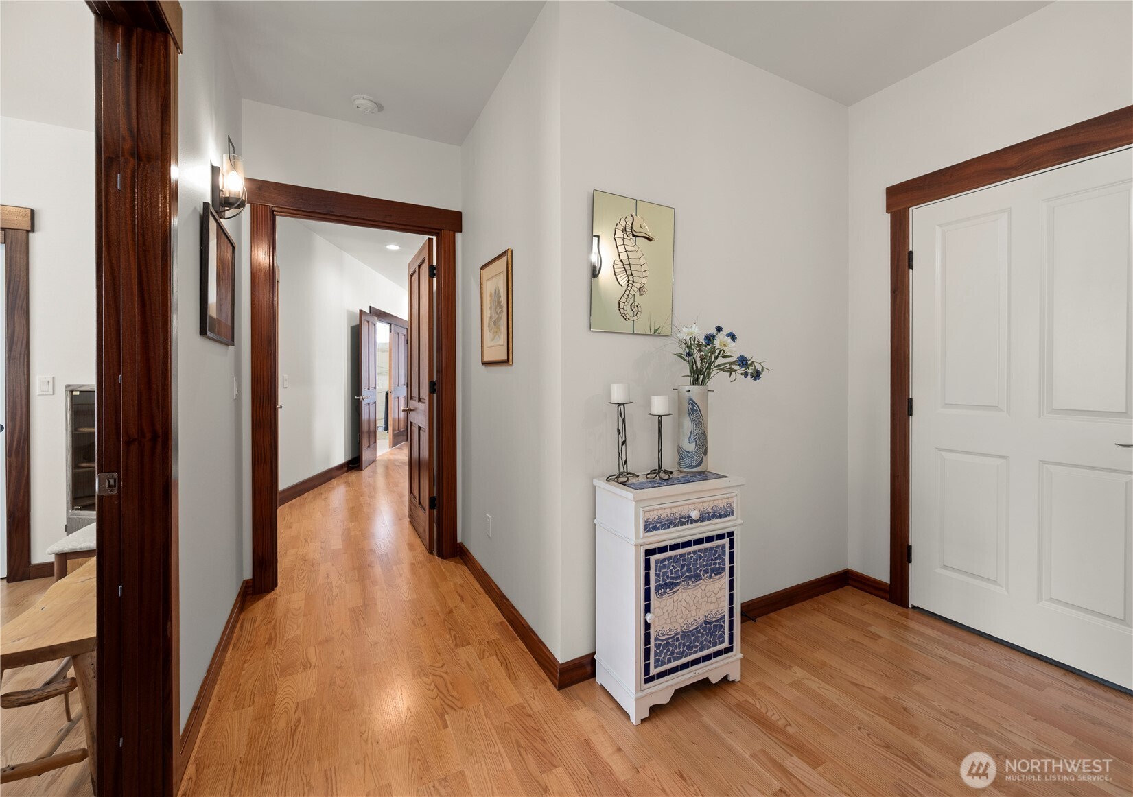 3803 West 2nd Street Anacortes, WA 98221 - Photo 26 of 40 a view of a hallway with wooden floor and cabinet
