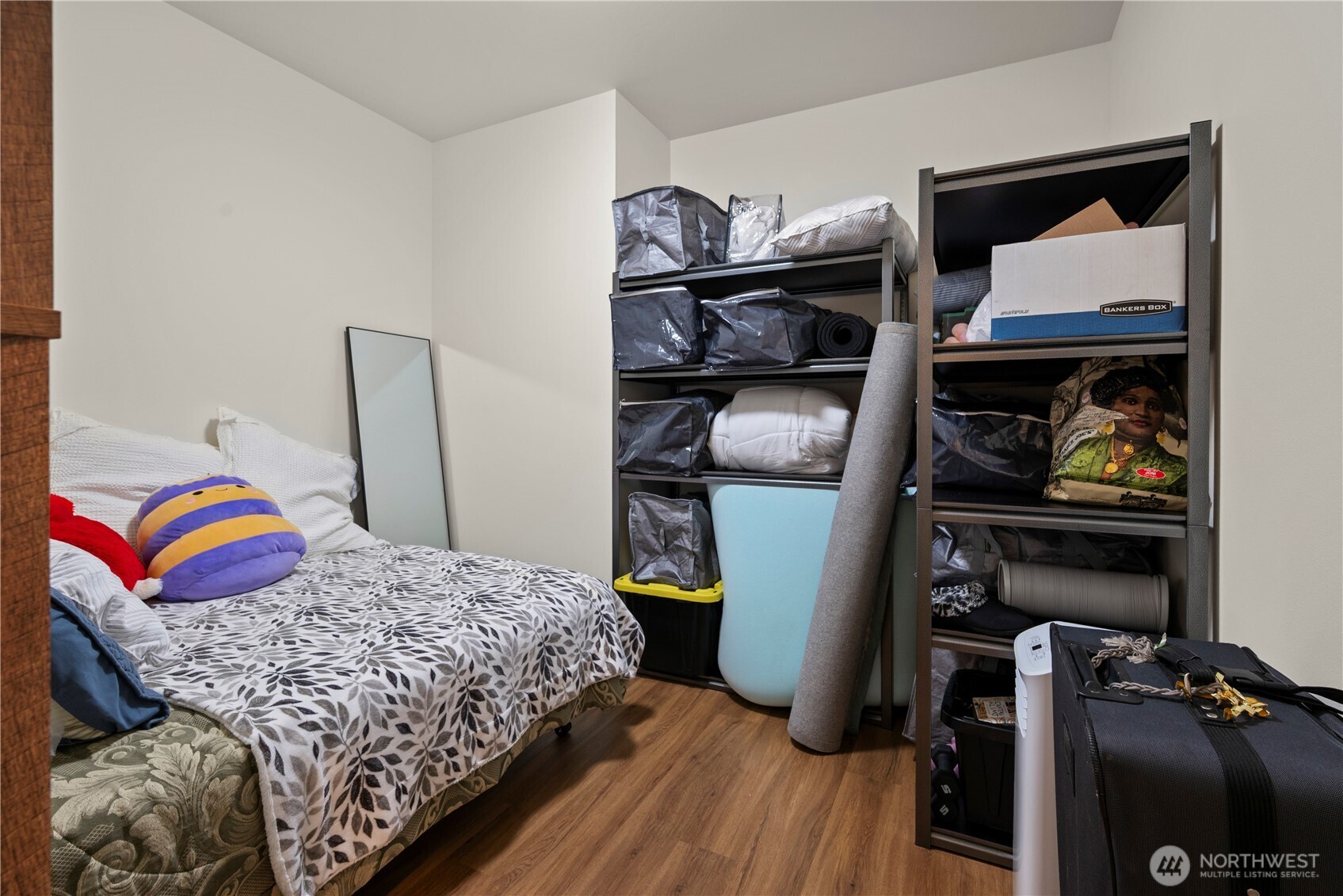 3803 West 2nd Street Anacortes, WA 98221 - Photo 34 of 40 a bedroom with a bed and closet