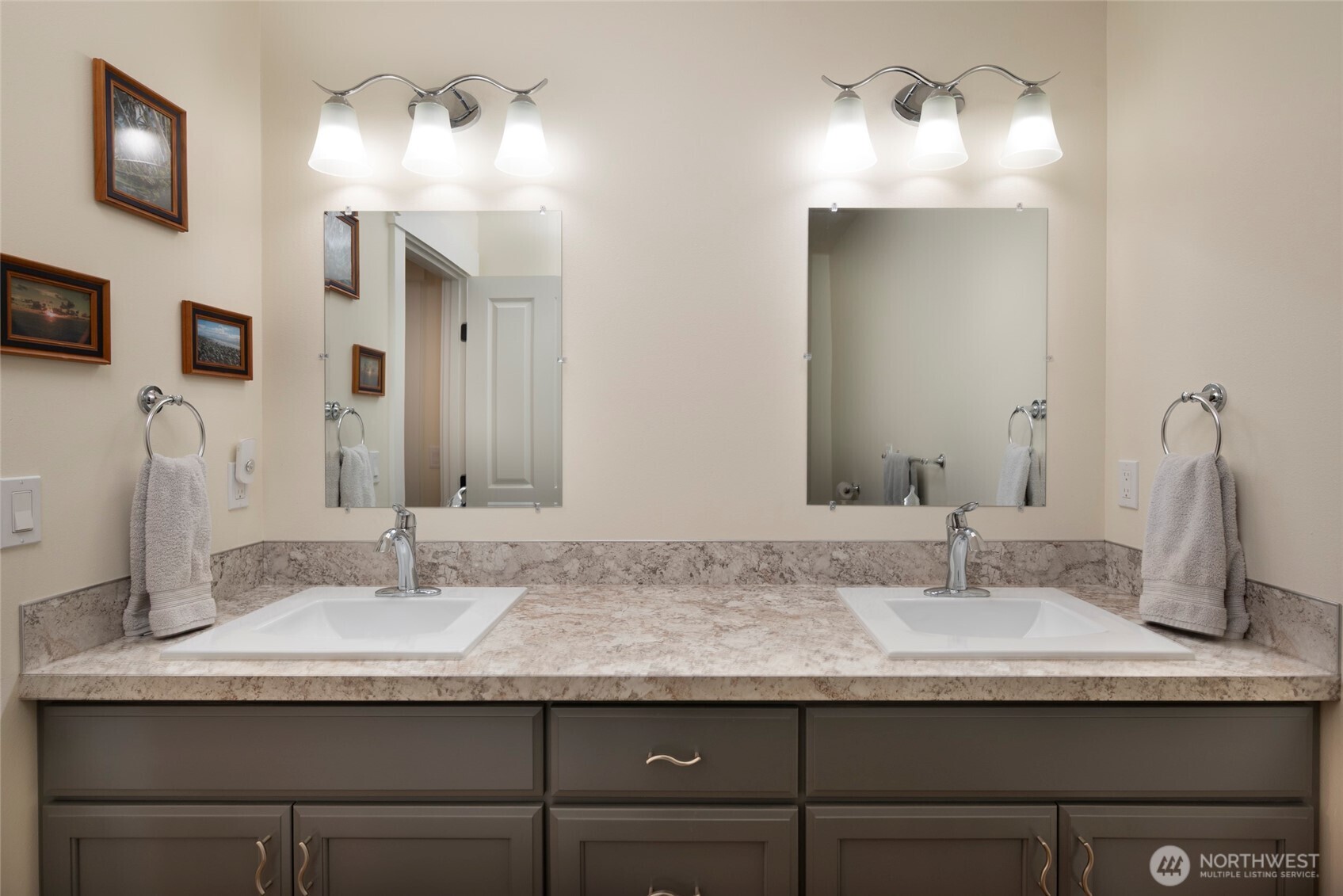 3803 West 2nd Street Anacortes, WA 98221 - Photo 36 of 40 a bathroom with a sink double vanity and a mirror