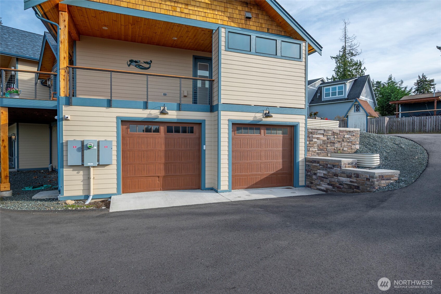 3803 West 2nd Street Anacortes, WA 98221 - Photo 4 of 40 a front view of a house with a garage