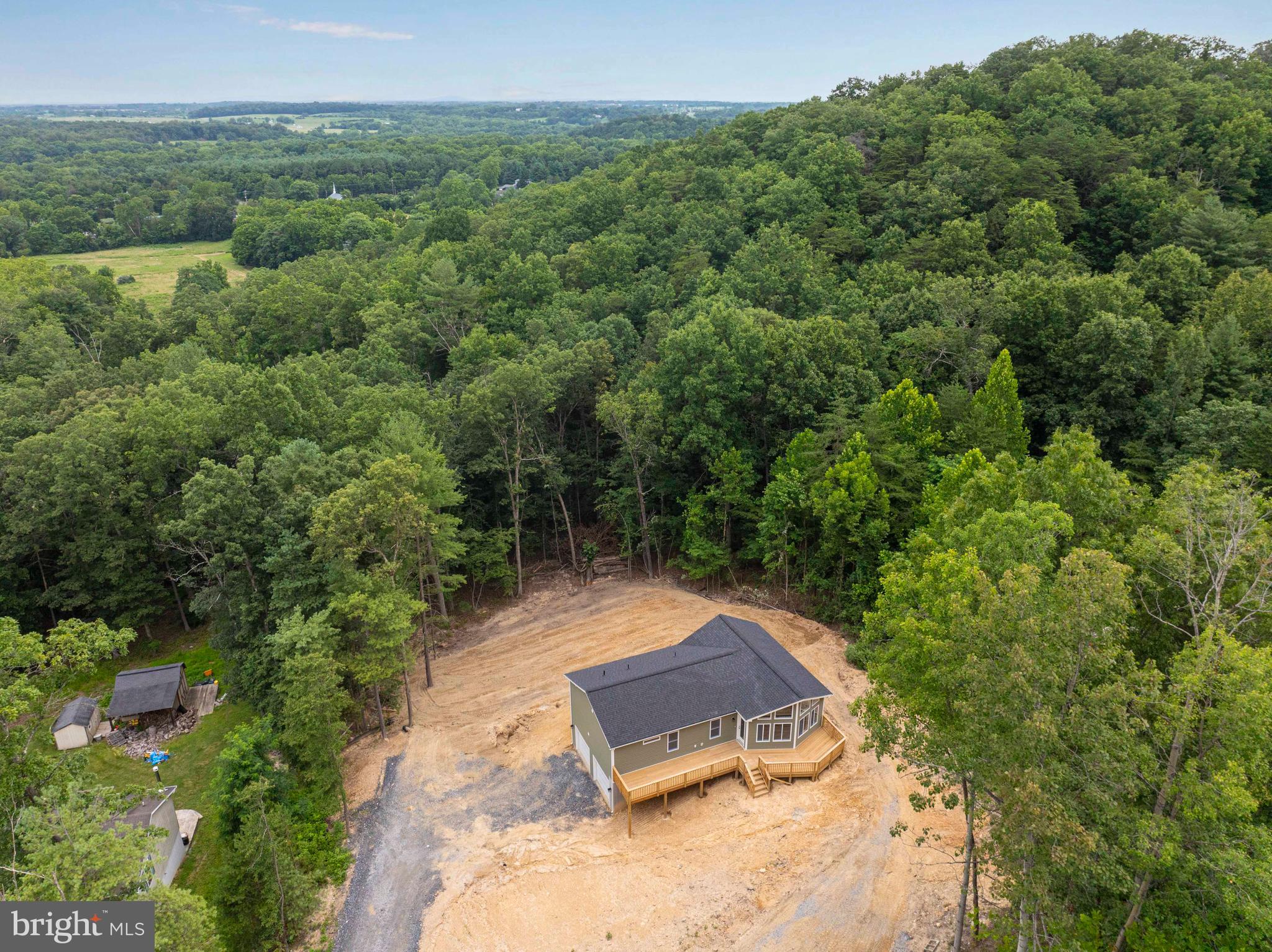 125 Spring Hollow Road Front Royal, VA 22630 - Photo 6 of 84 an aerial view of a house with a yard