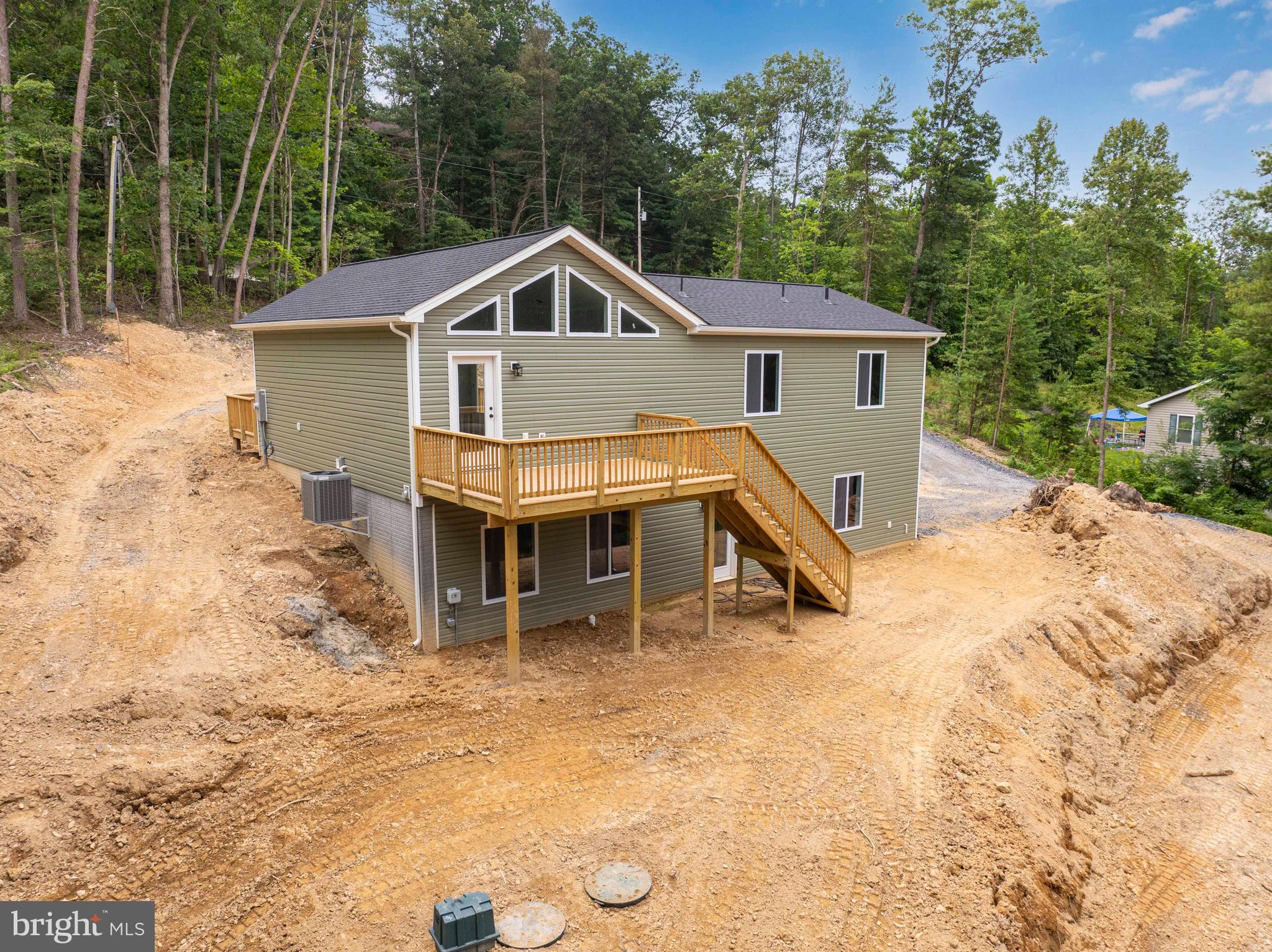 125 Spring Hollow Road Front Royal, VA 22630 - Photo 10 of 84 a view of a house with a yard