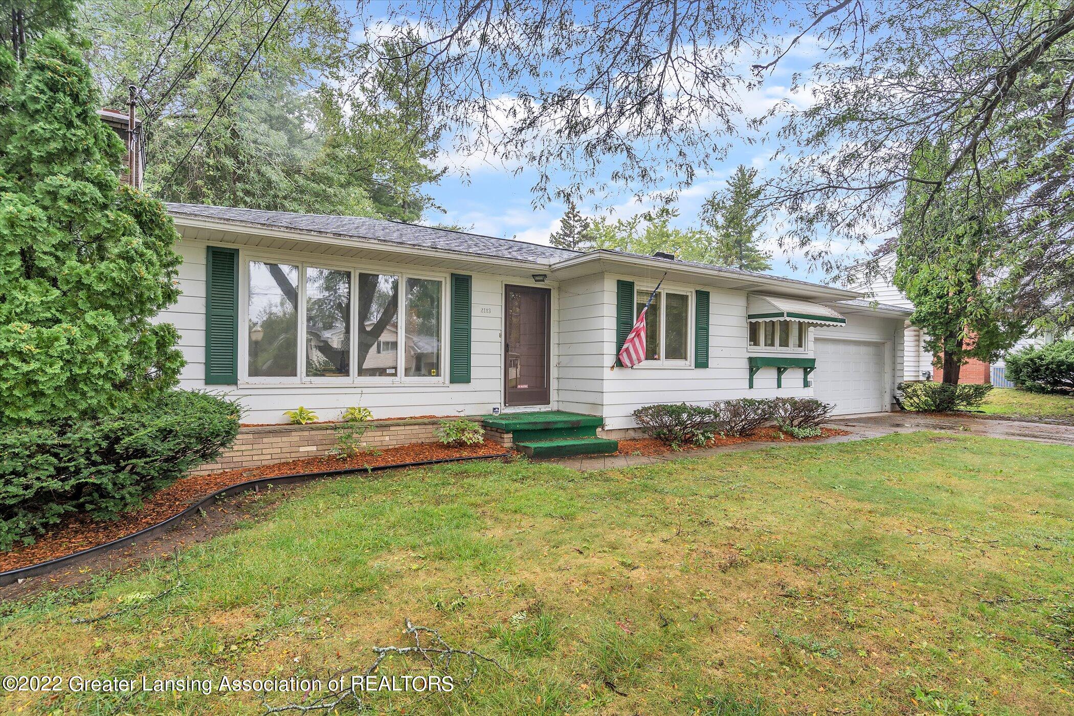 2113 Byrnes Road Lansing, MI 48906 - Photo 2 of 28 02-2113-Brynes-Rd-WindowStill-Real-Estat