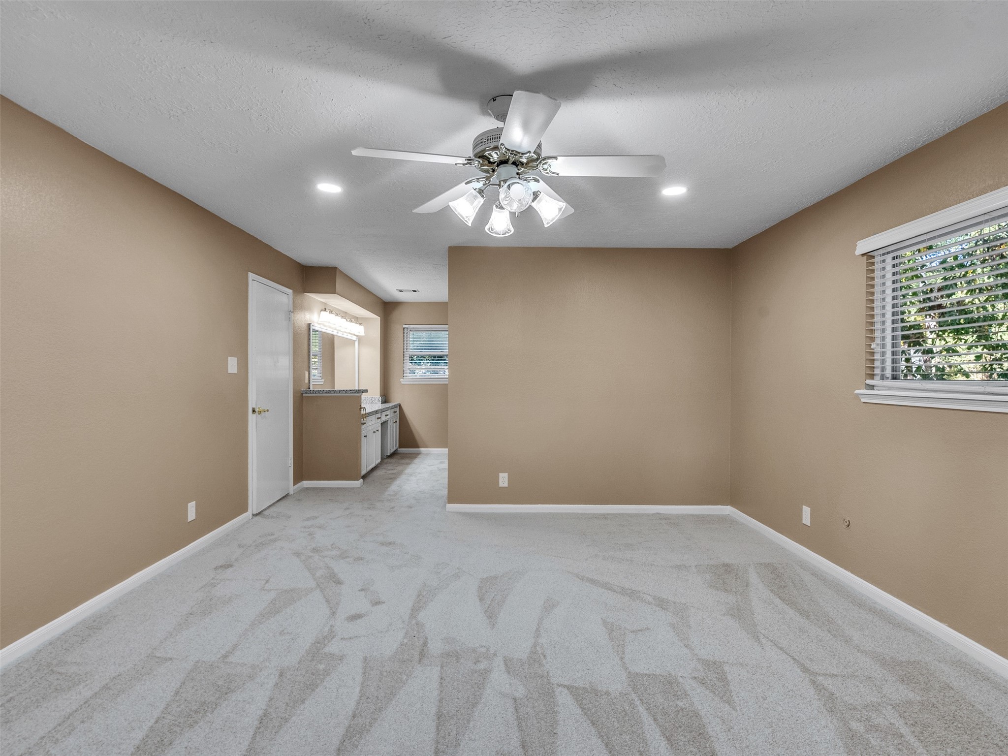 6702 Moccasin Bend Drive Spring, TX 77379 - Photo 24 of 35 a view of an empty room with window and wooden floor
