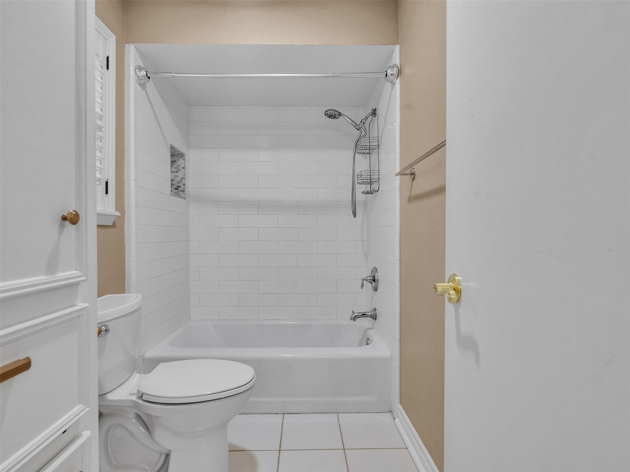 6702 Moccasin Bend Drive Spring, TX 77379 - Photo 26 of 35 a bathroom with a granite countertop bathtub shower and toilet