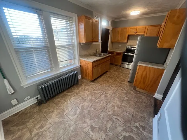 a view of living room with furniture and a flat screen tv