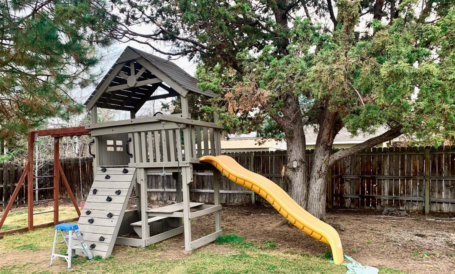 61245 Victory Loop Bend, OR 97702 - Photo 15 of 16 Fun play structure included!