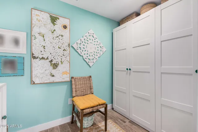a living room with furniture a washer and dryer