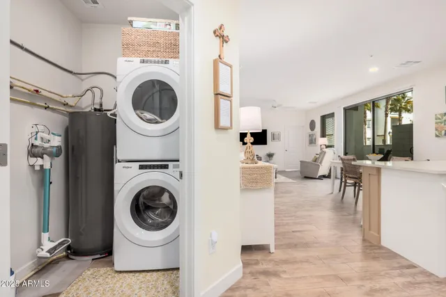 a living room with furniture and flowers