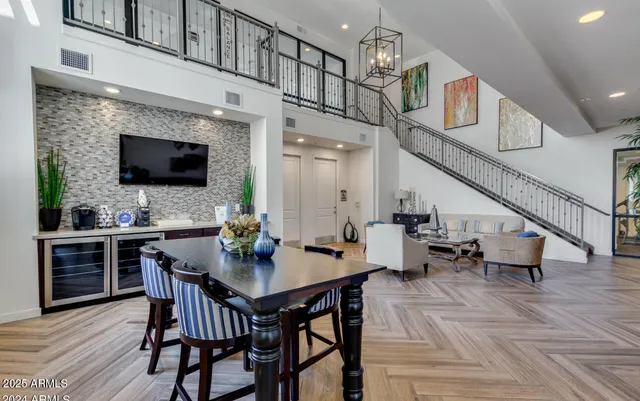a room with furniture and kitchen view