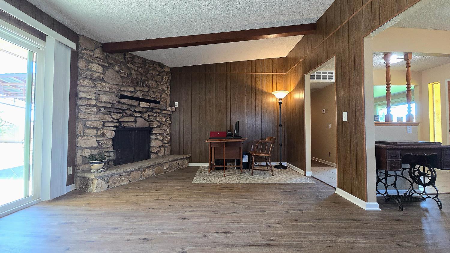 1205 Pine Street Selma, CA 93662 - Photo 16 of 41 a dining room with furniture and a fireplace