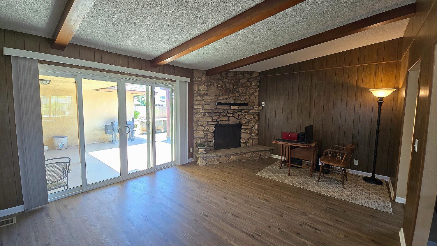 1205 Pine Street Selma, CA 93662 - Photo 17 of 41 a view of a livingroom with furniture and a fireplace