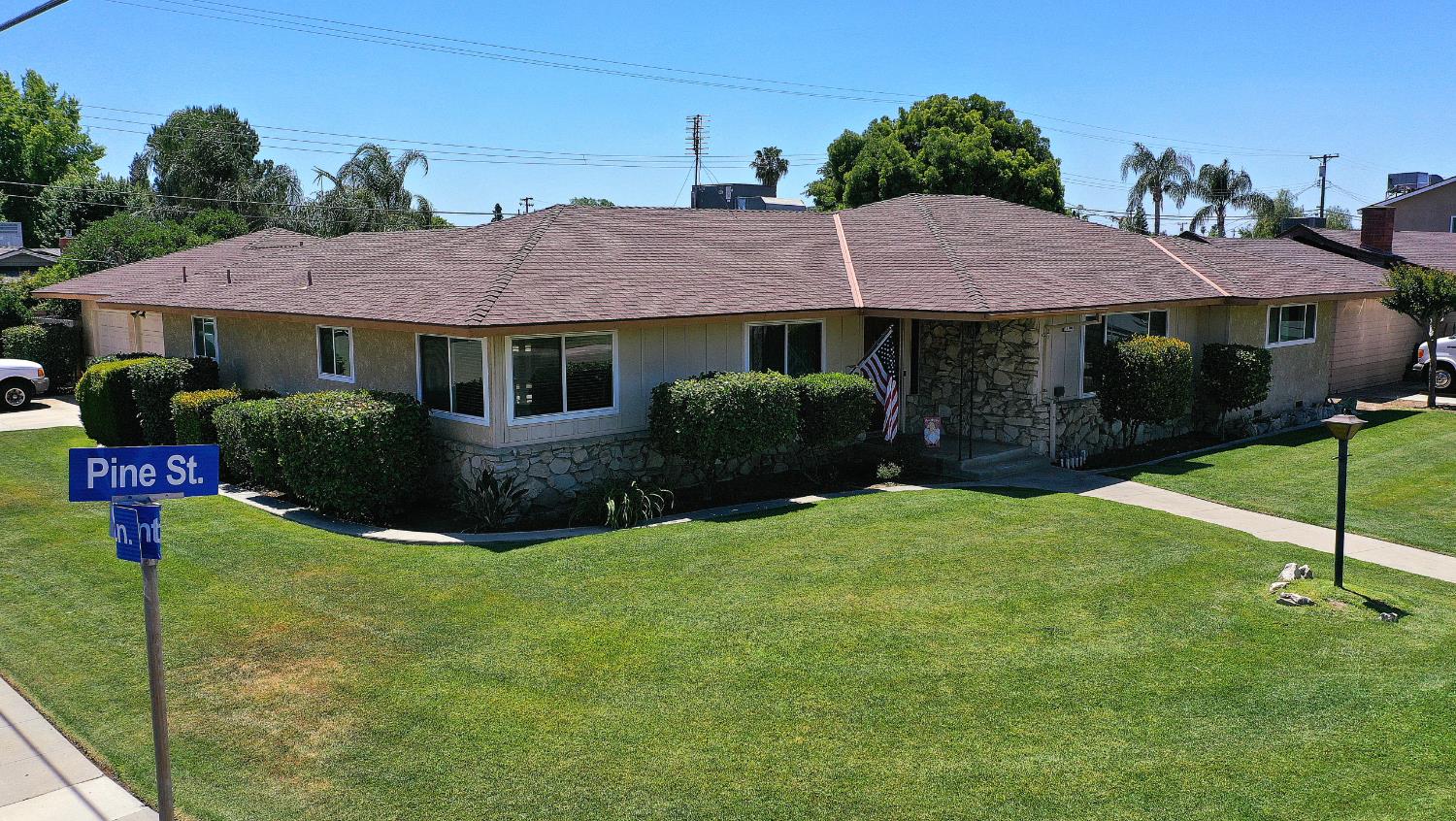 1205 Pine Street Selma, CA 93662 - Photo 2 of 41 a view of a house with garden