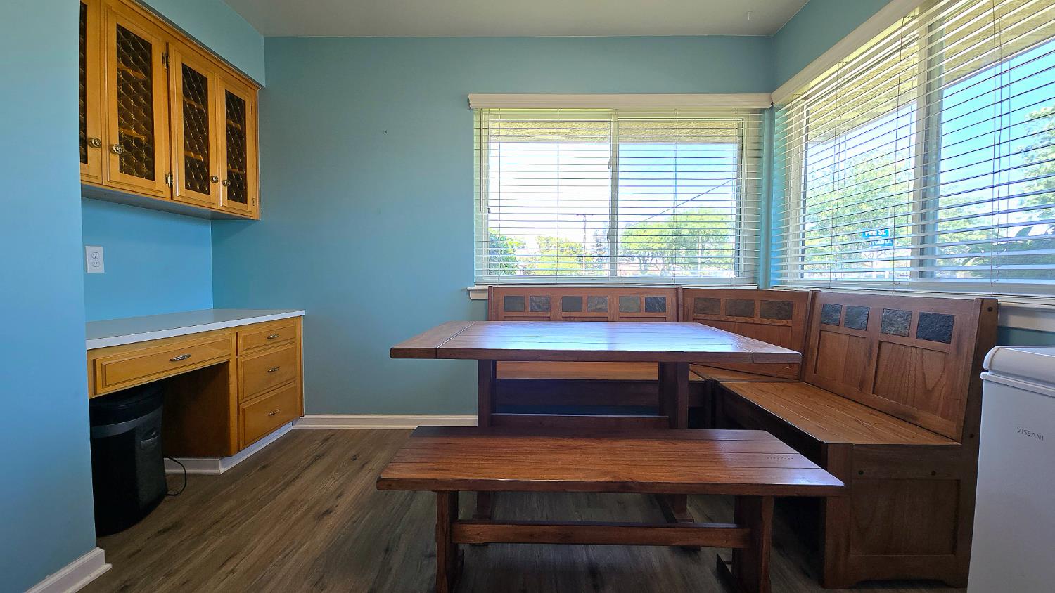 1205 Pine Street Selma, CA 93662 - Photo 21 of 41 a table and chairs in a room with a window