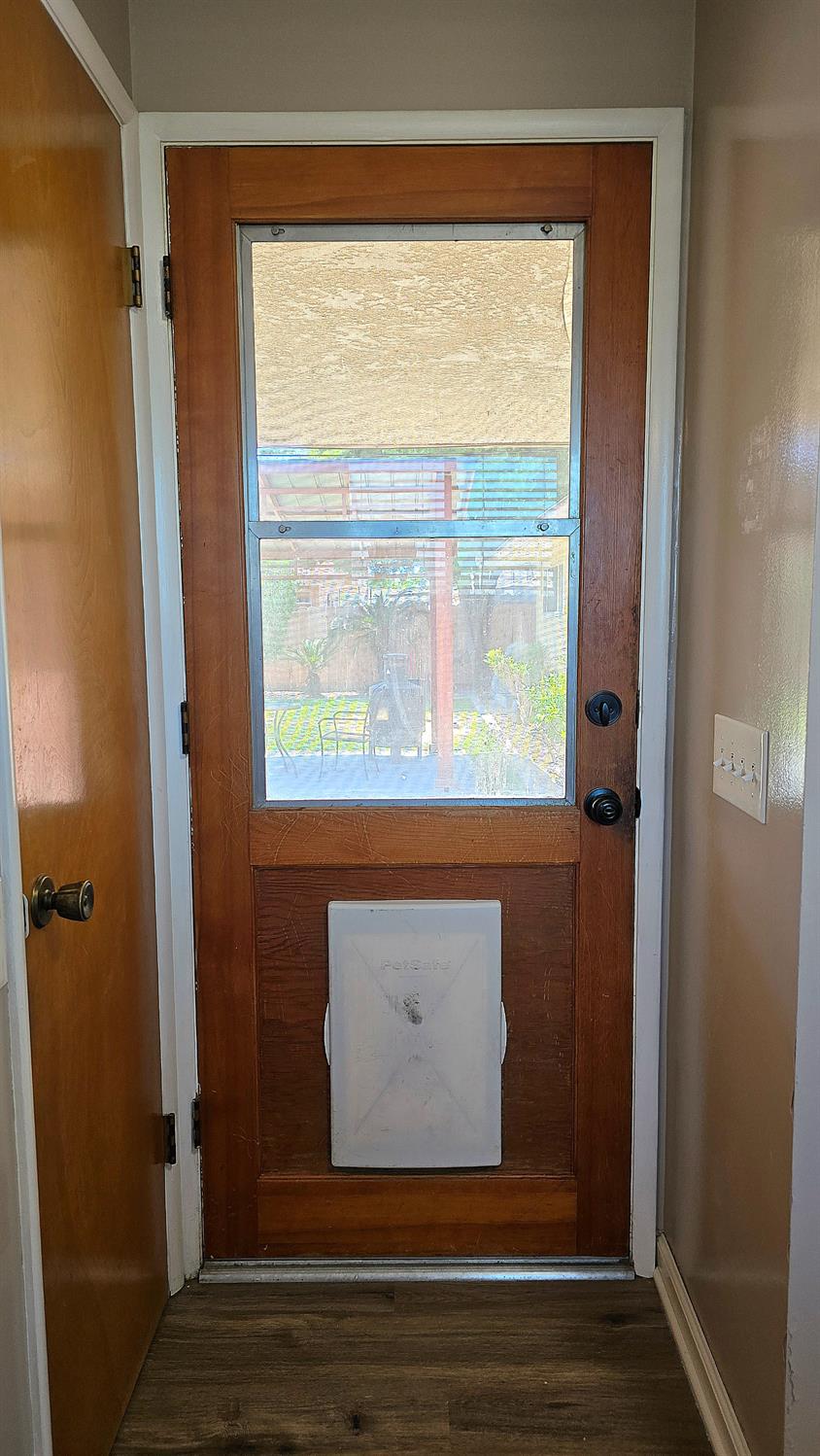 1205 Pine Street Selma, CA 93662 - Photo 25 of 41 a view of a small space with wooden floor and a window