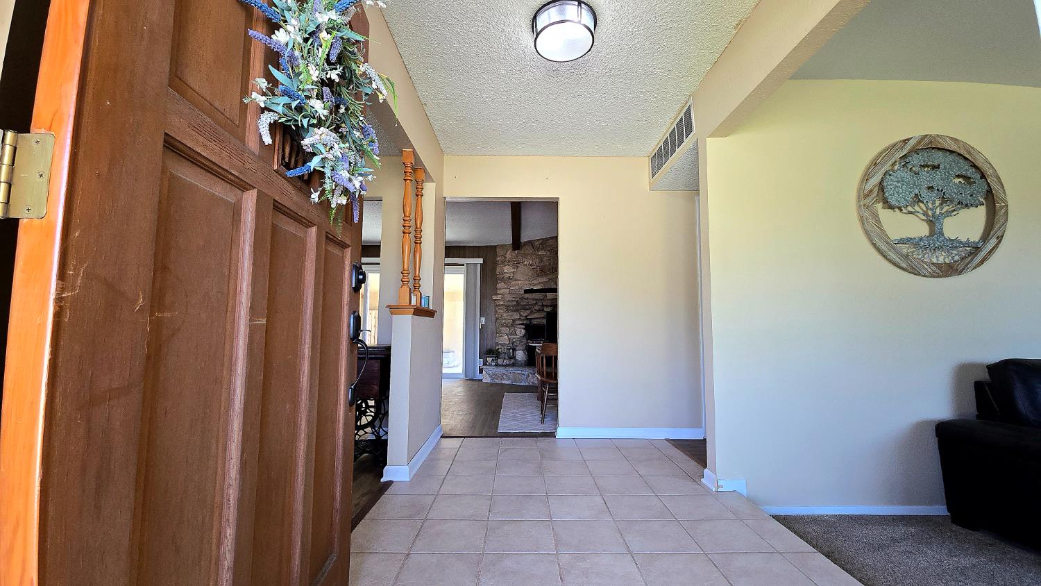 1205 Pine Street Selma, CA 93662 - Photo 10 of 41 a view of a hallway with entryway