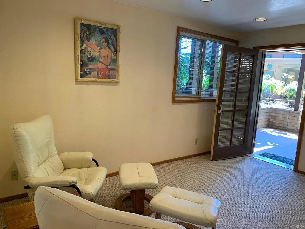 714 Passiflora Avenue, Unit S Encinitas, CA 92024 - Photo 2 of 16 a living room with furniture and a window