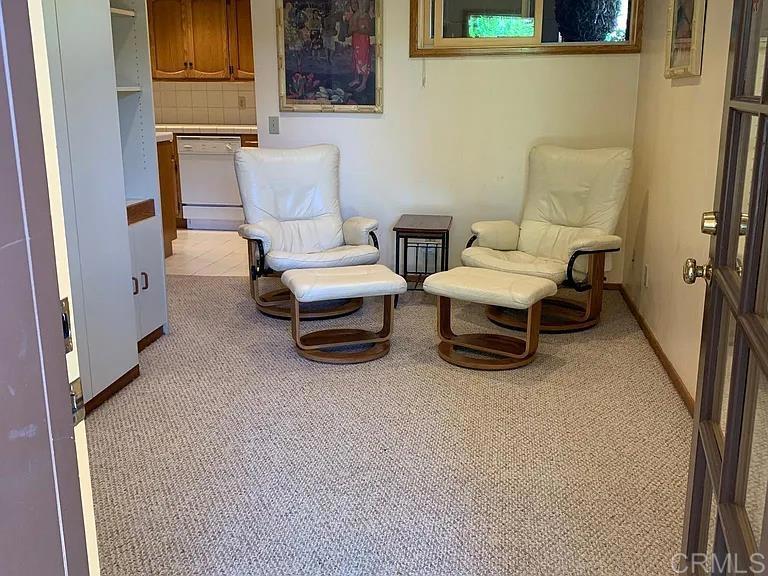 714 Passiflora Avenue, Unit S Encinitas, CA 92024 - Photo 3 of 16 a living room with furniture and a rug