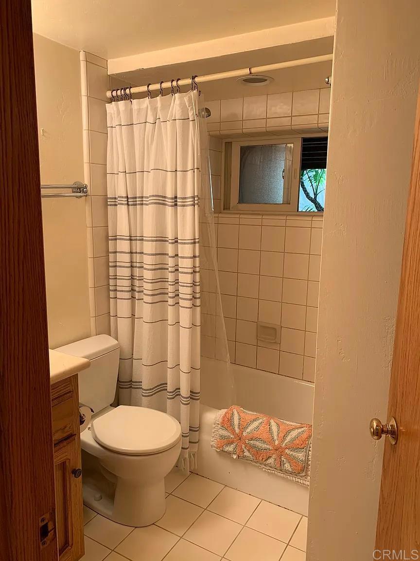 714 Passiflora Avenue, Unit S Encinitas, CA 92024 - Photo 10 of 16 a bathroom with a toilet and a shower