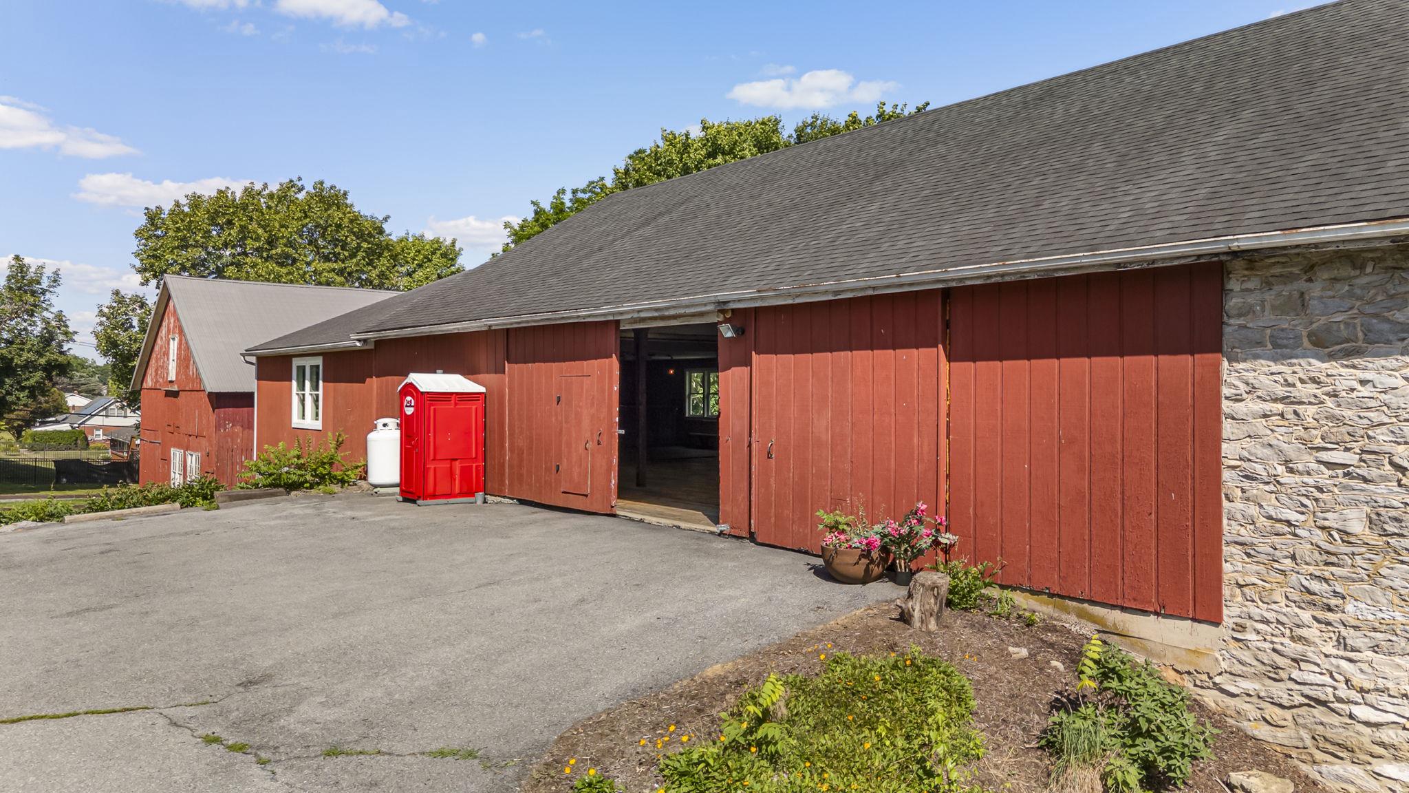416 Snyder Road Reading, PA 19605 - Photo 57 of 65 a front view of a house with a yard and garage