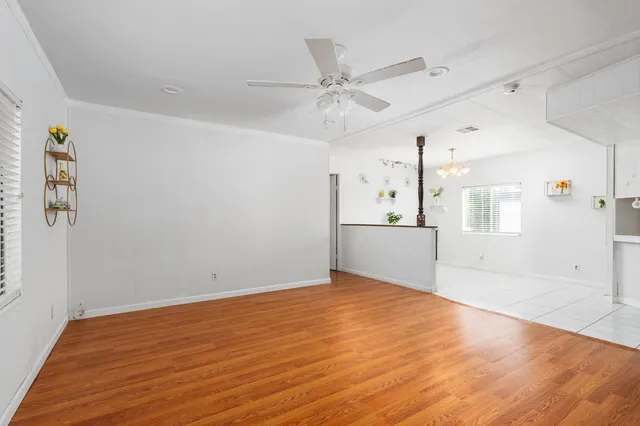 a kitchen with cabinets and appliances