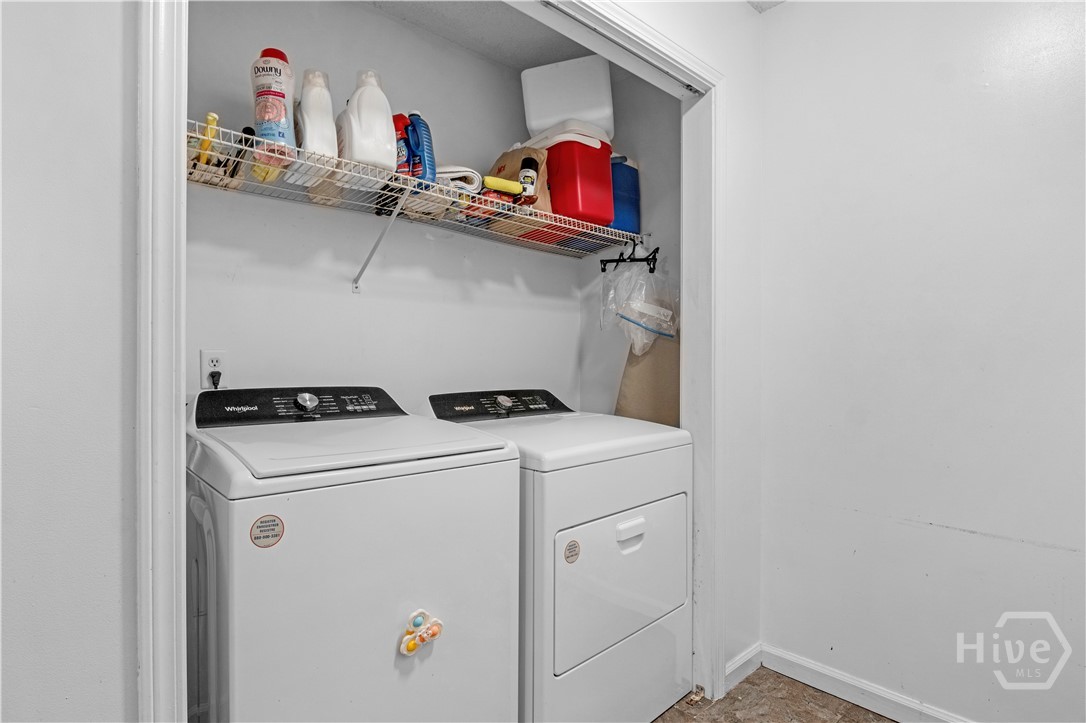 12 East Red Fox Court Midway, GA 31320 - Photo 17 of 29 Laundry closet next to kitchen
