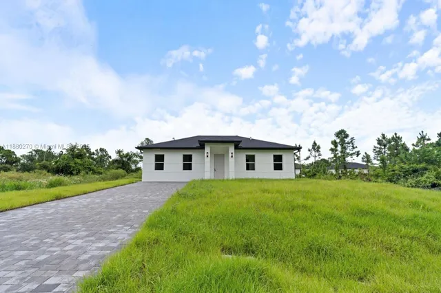 $319,000 | 710 Peacock Avenue, Lehigh Acres, FL 33974